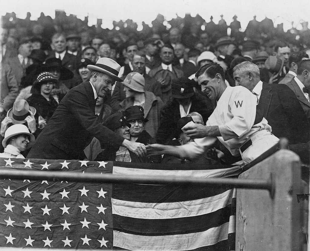 Stanley_Harris_gives_Calvin_Coolidge_the_baseball_that_opened_the_1924_World_Serie